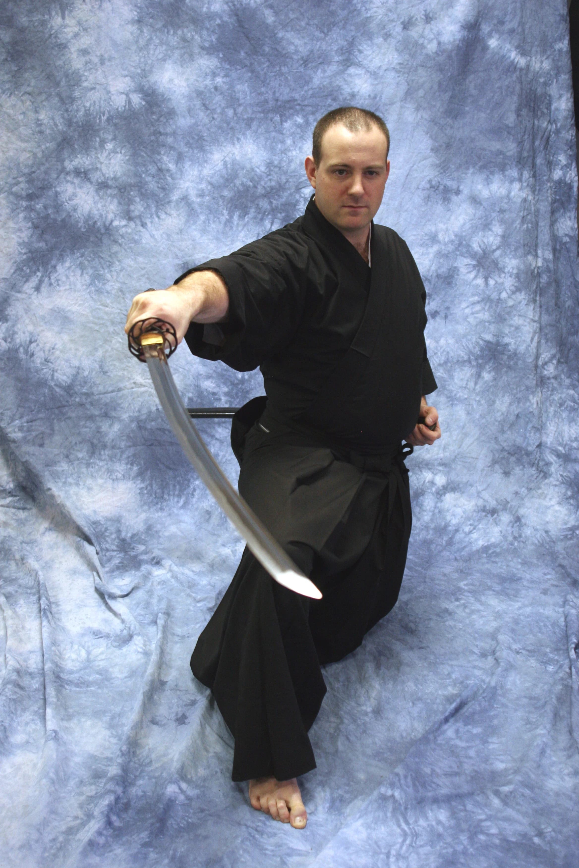 Shifu performing a side slash with a sword