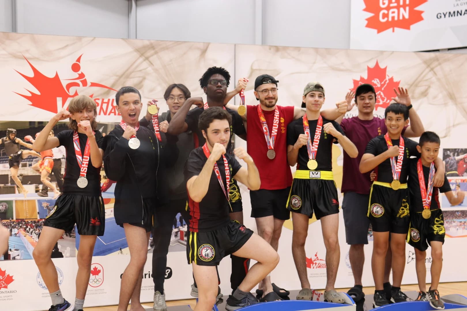 The Sanda team posing with medals after a competition