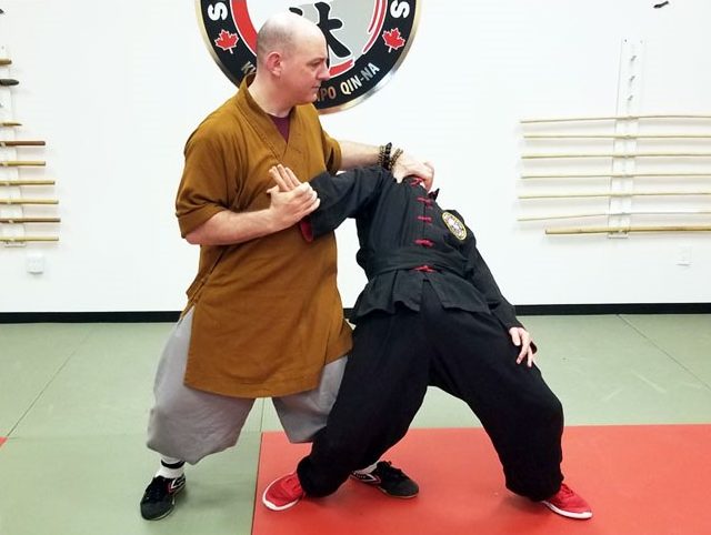 Shifu Tim Wakefield demonstrating a kung-fu Qin-Na or grappling technique at Shaolin Martial Arts Canada
