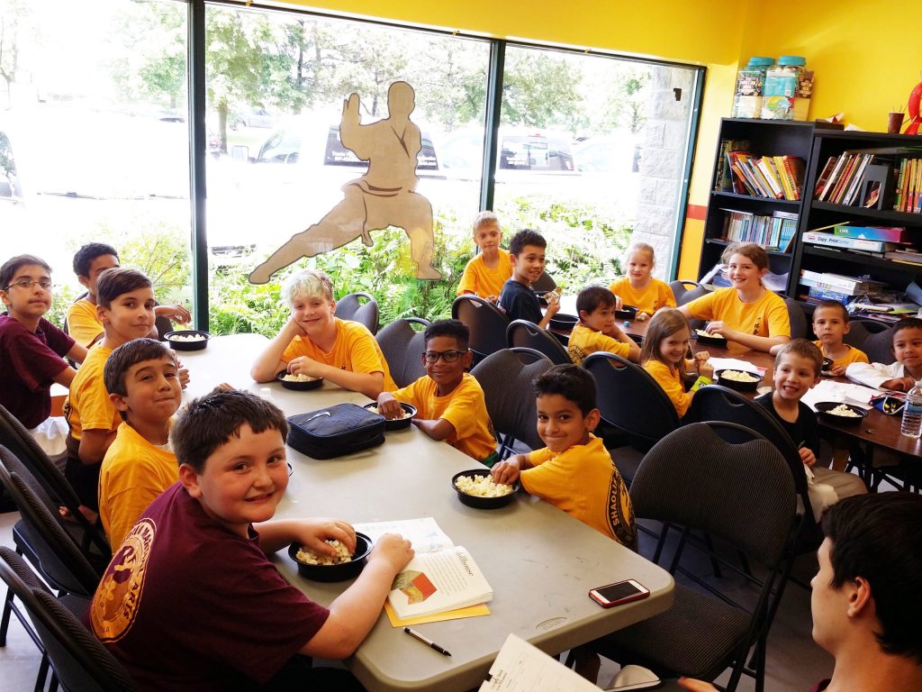 After School Pickup students enjoying a snack in the After School Classroom